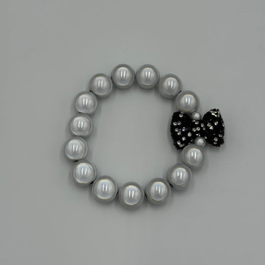Armband "La Brisa – Bracelet Bow Glam Weiß Schwarz-Weiß"